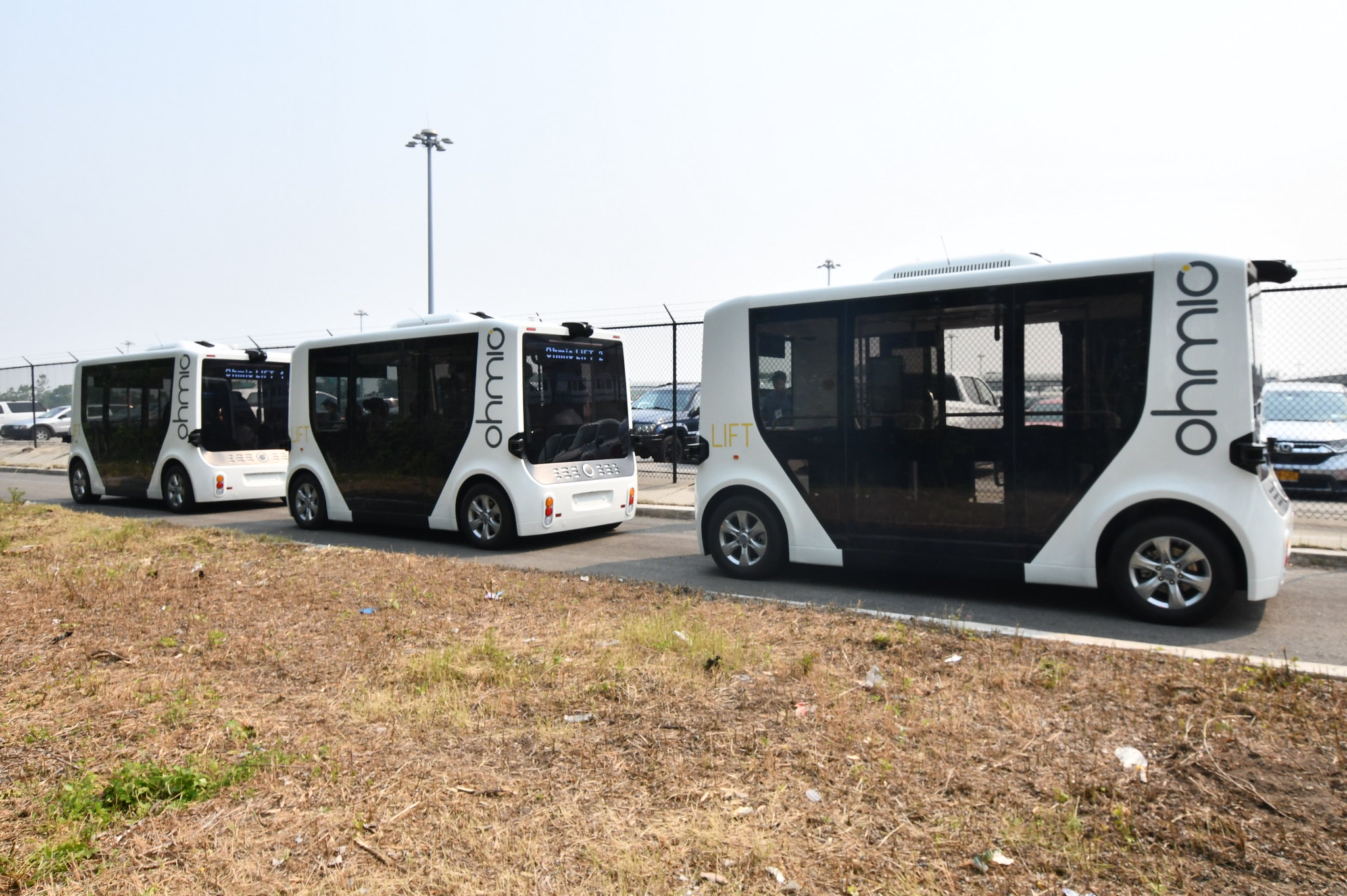 A three-vehicle autonomous platoon on a closed road within a parking lot at John F. Kennedy International Airport