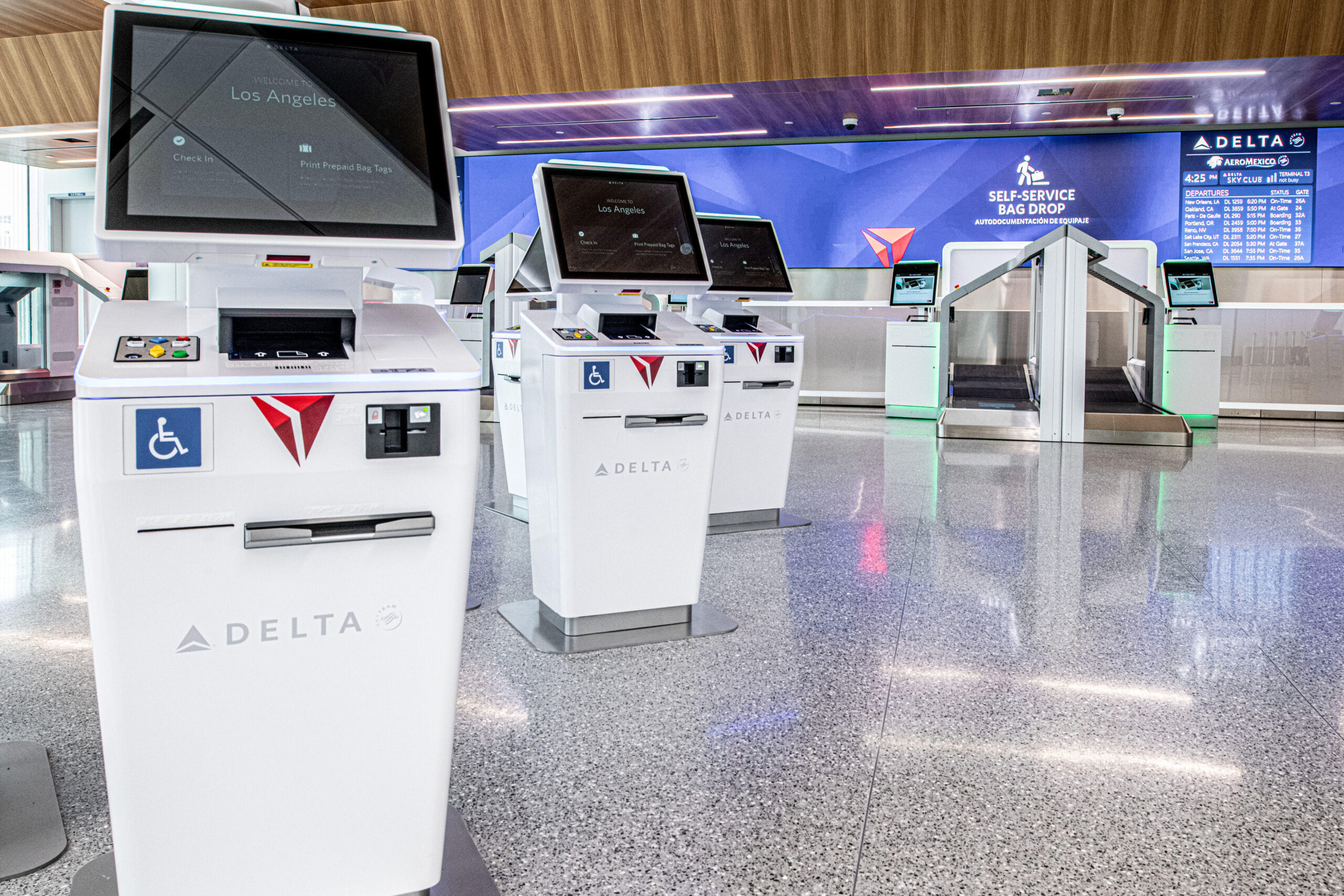 Self-service check-in and bag-drog kiosks at LAX's new west headhouse