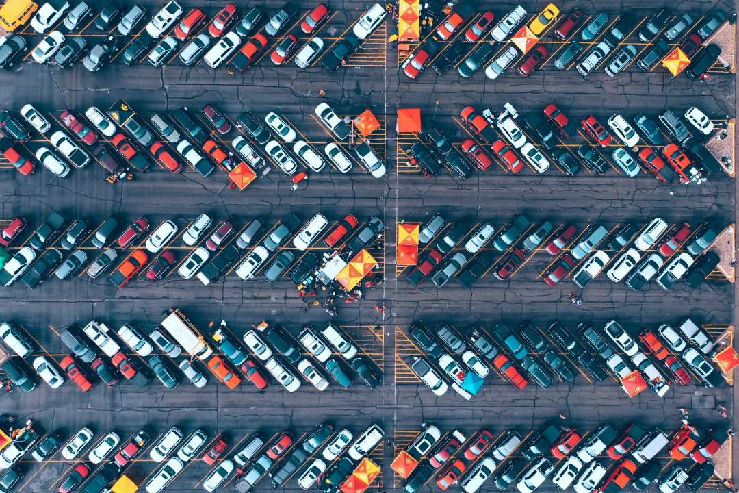 A busy car park viewed from above