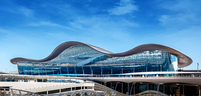 The building’s glass exterior maximises natural light while creating a monumental space inside the terminal