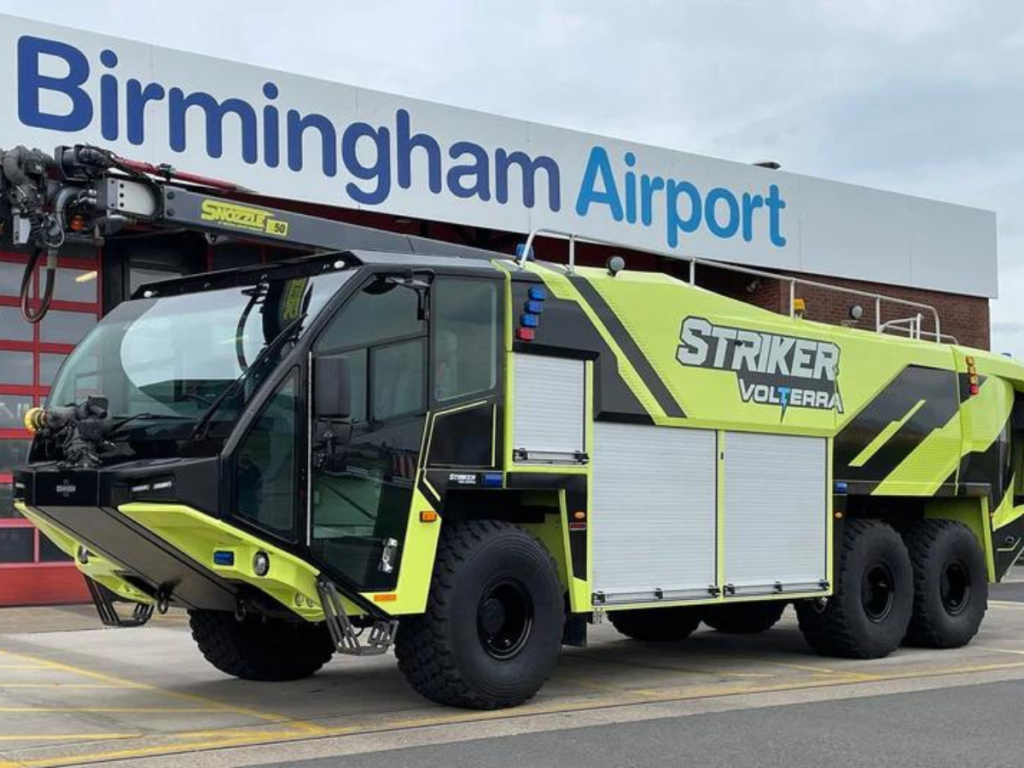 A yellow Oshkosh Striker outside Birmingham Airport