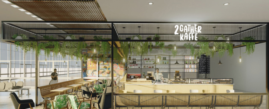 A bright and open cafe situated in an airport terminal. There are hanging plants and a sign which reads "2 Gather Kaffe"