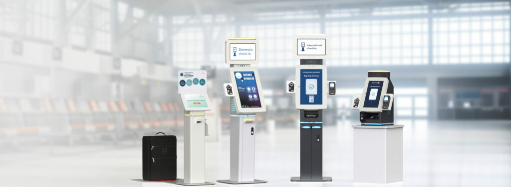Four different models of airline kiosk at an airport terminal