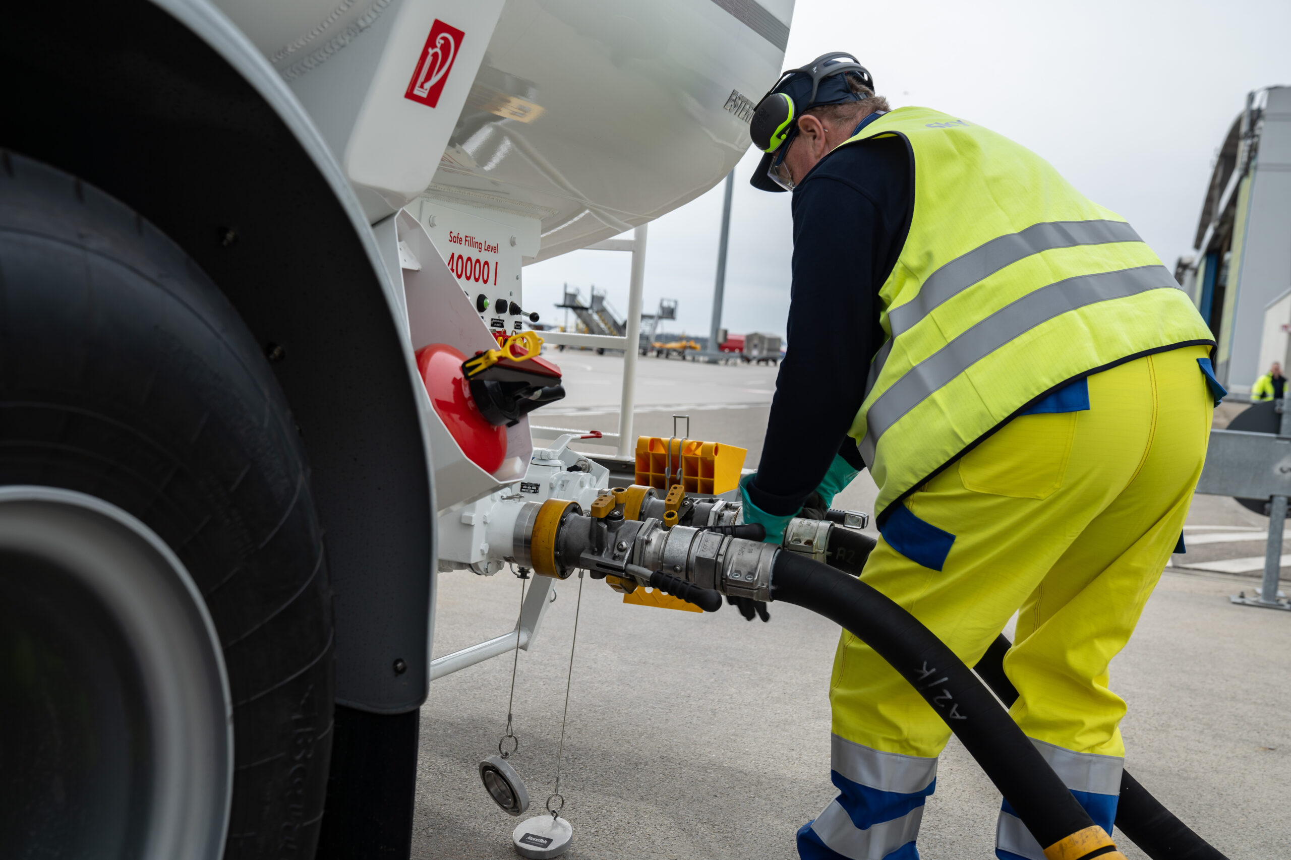 Mr. Müller, who has worked at Skytanking for 12 years, refueling the e-tanker.