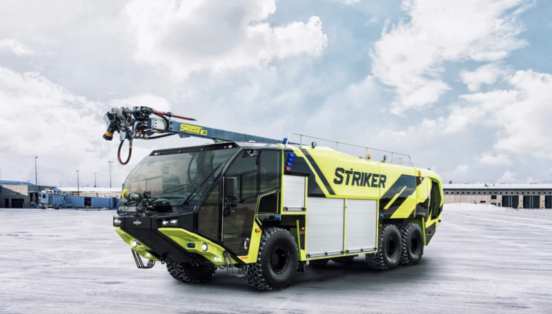 A yellow and black airport firefighting vehicle