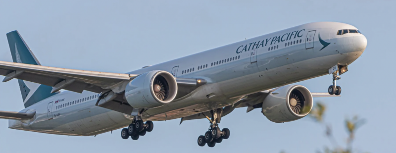 Cathay Pacific jet midair, livery is white and light blue