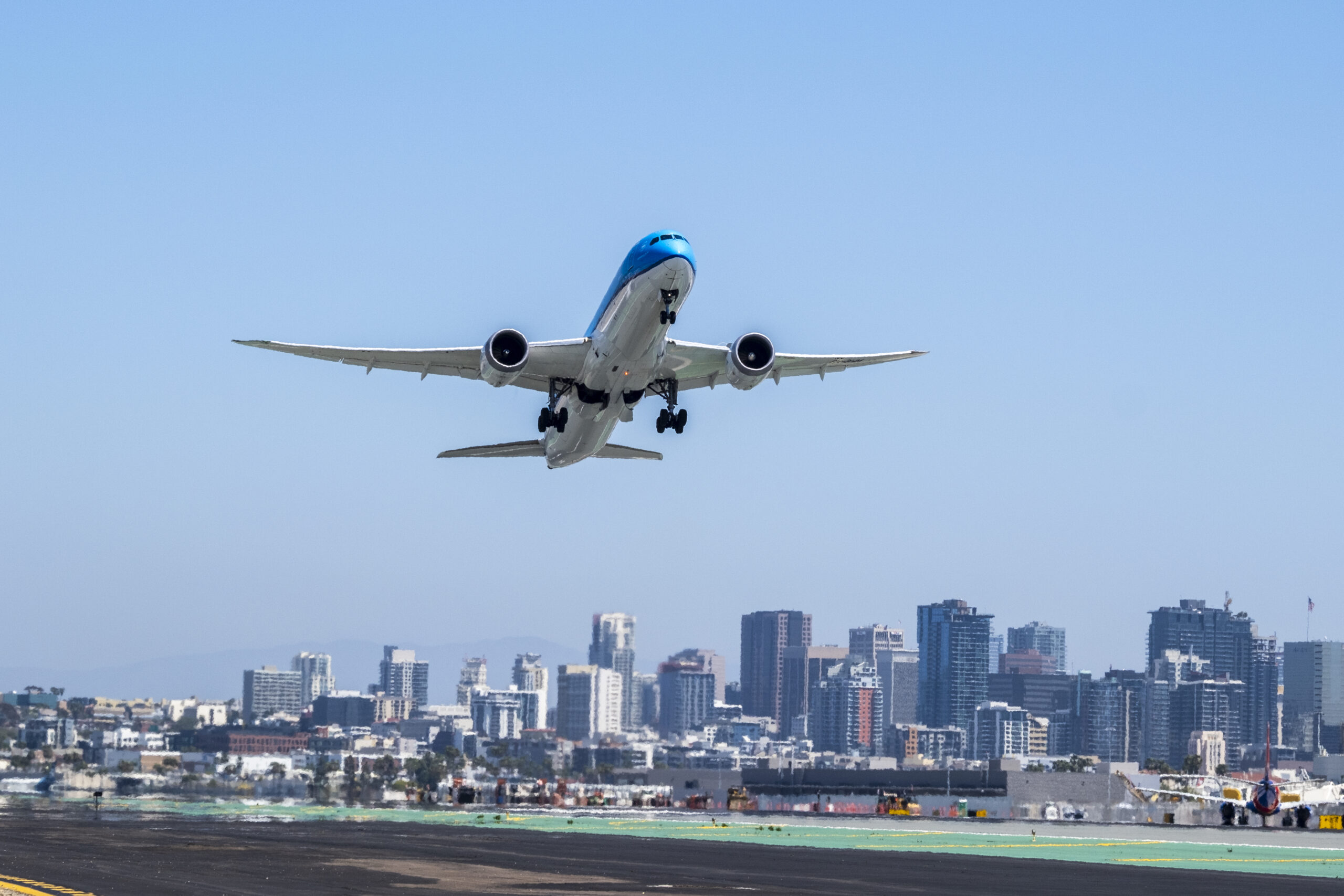 An image of the first service between SAN & AMS leaving the runway