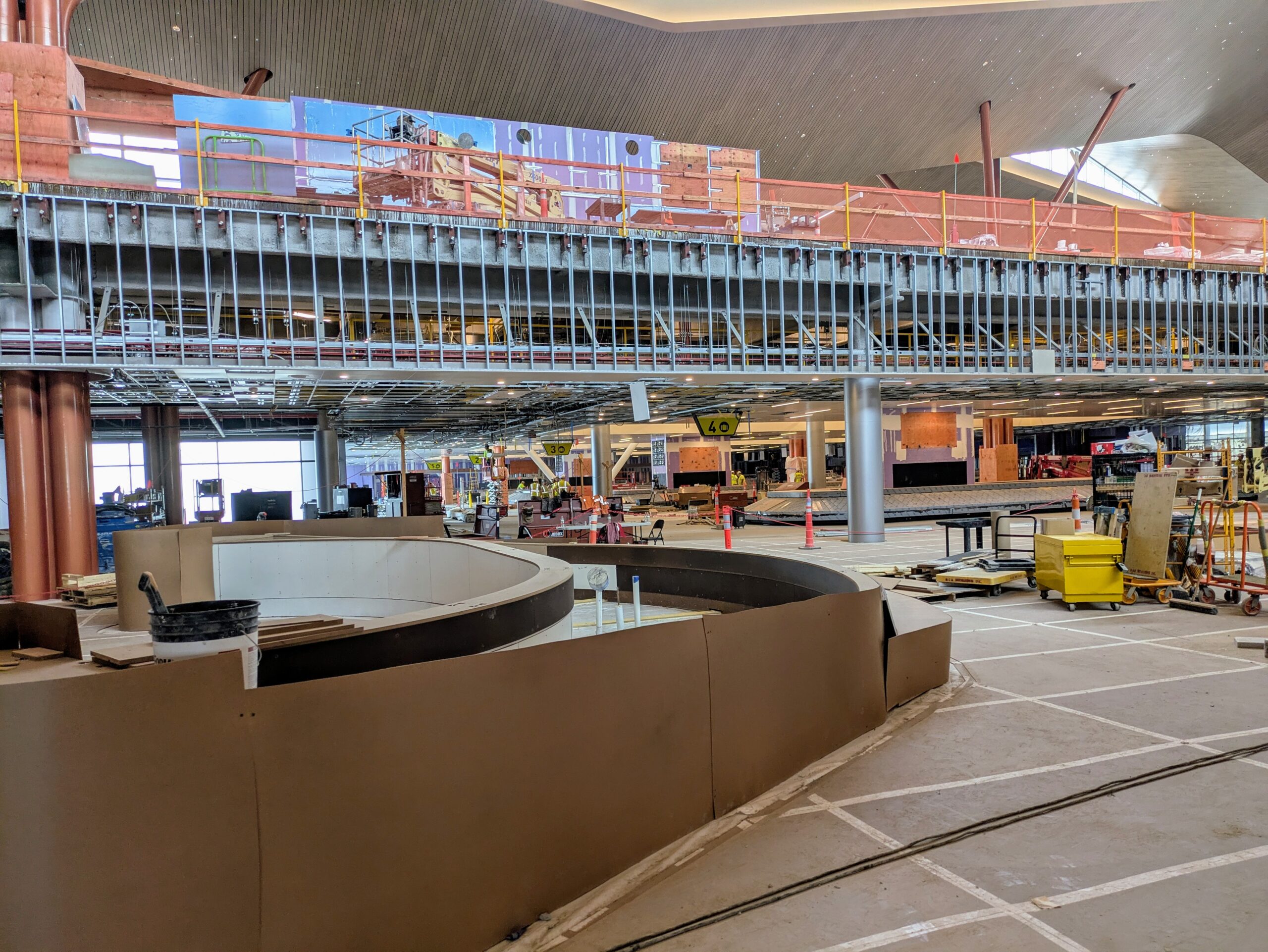 A new bar being constructed in baggage claim