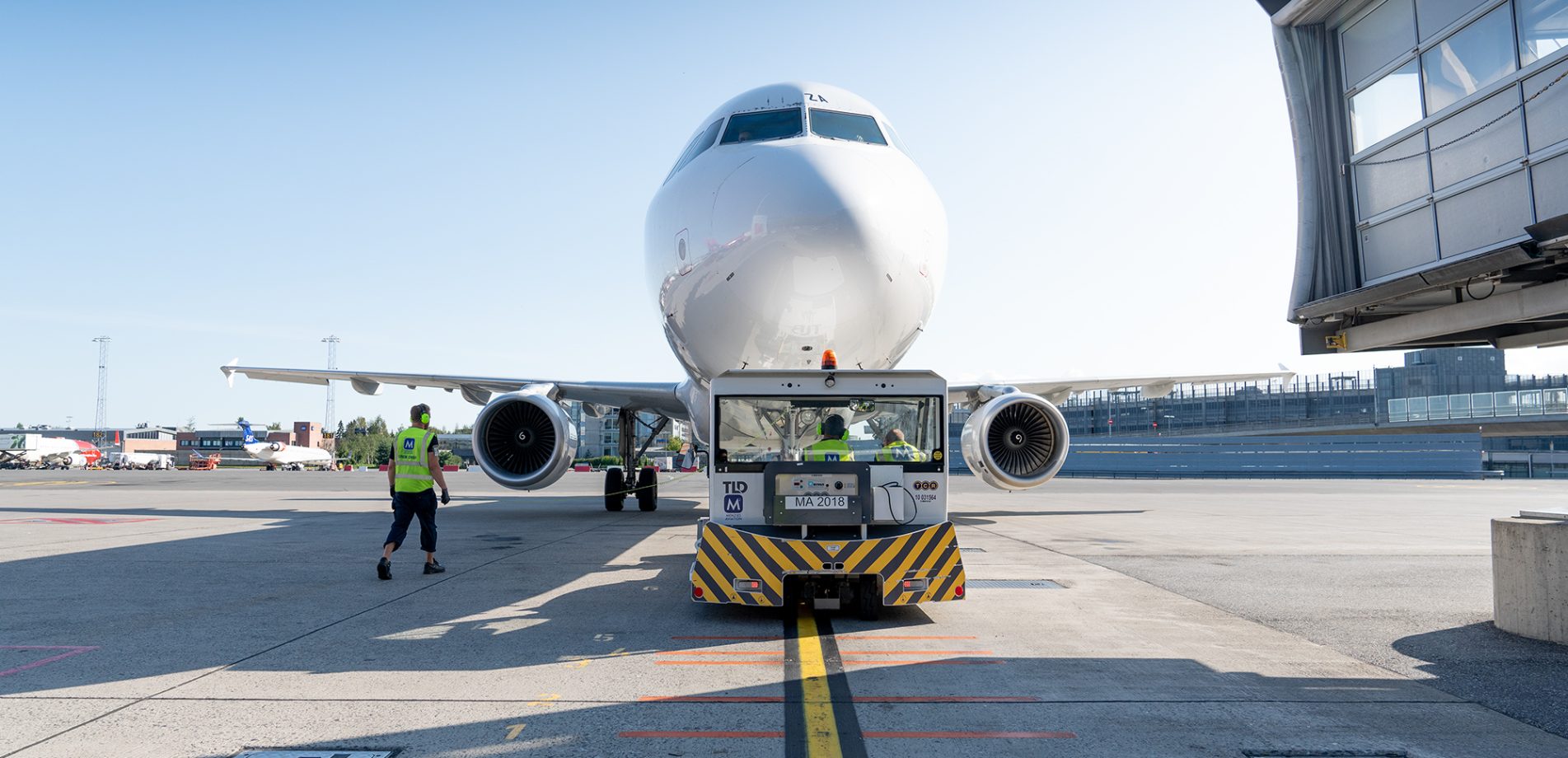 A plane waiting on a runway