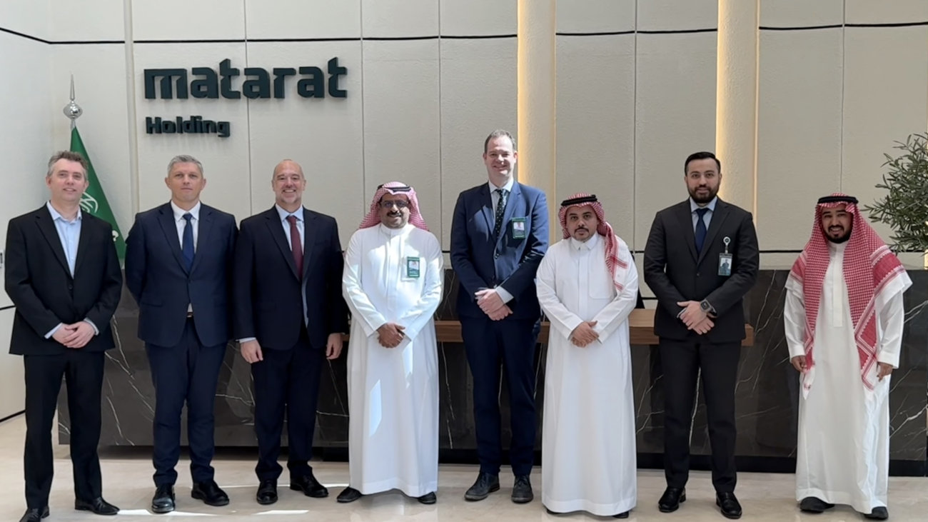 A line of men stood with their hands together