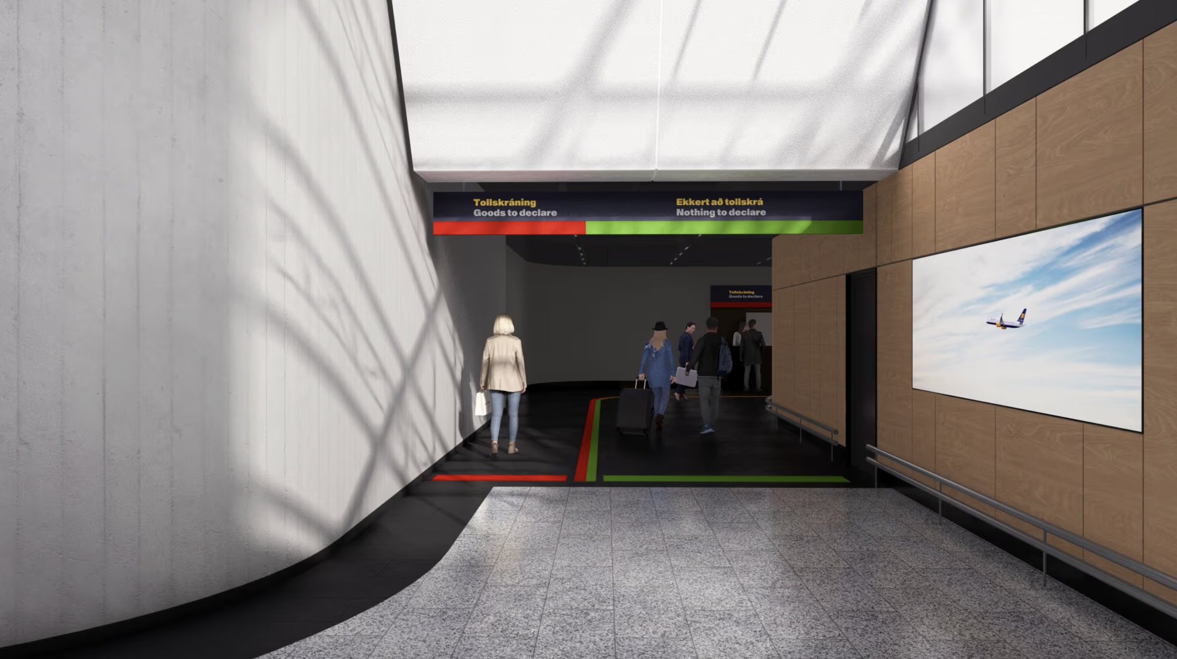 View into the customs corridor from the baggage claim area. After passing through the customs corridor, passengers arrive in the terminal’s arrivals hall.