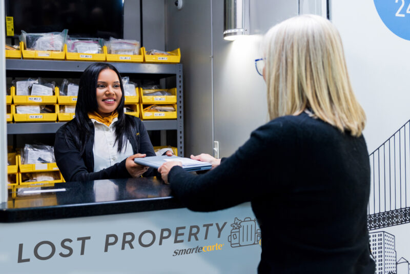 Female Employee from Smarte Carte smiling