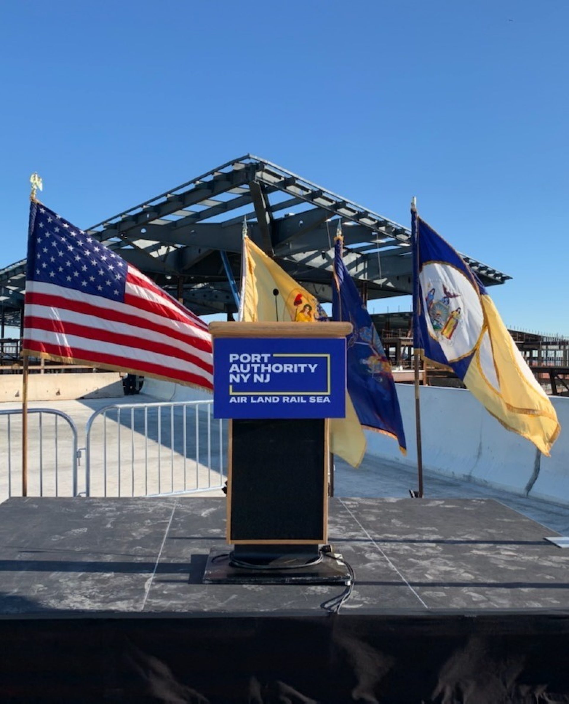 A podium backed by flags