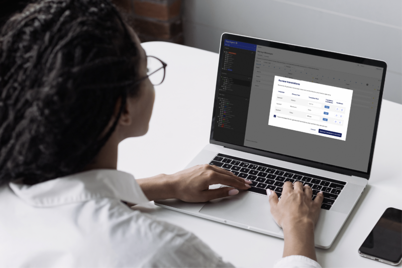 woman typing on laptop