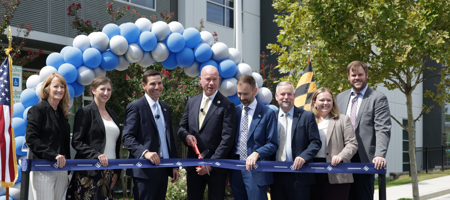 FAA Administrator Bedford joined the ribbon cutting at the $40-million Rohde & Schwarz USA factory.