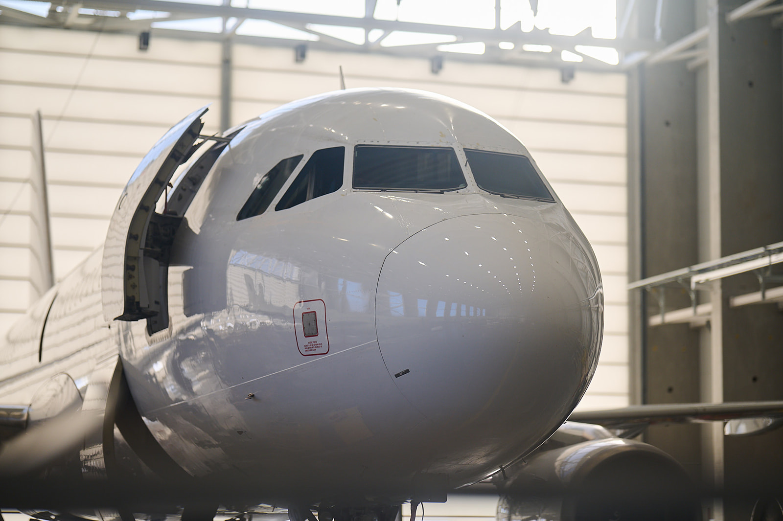 A plane on the ground ready for maintenance